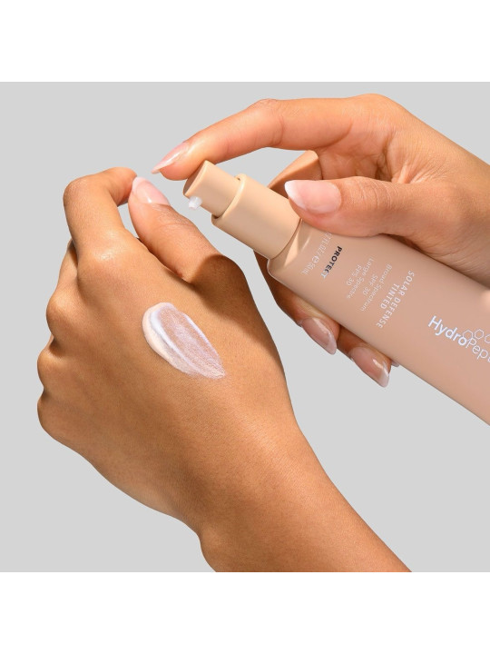 Зволожуючий тонуючий сонцезахисний крем HydroPeptide Solar Defense SPF 30, 50 мл Зволожуючий тонуючий сонцезахисний крем HydroPeptide Solar Defense SPF 30, 50 мл